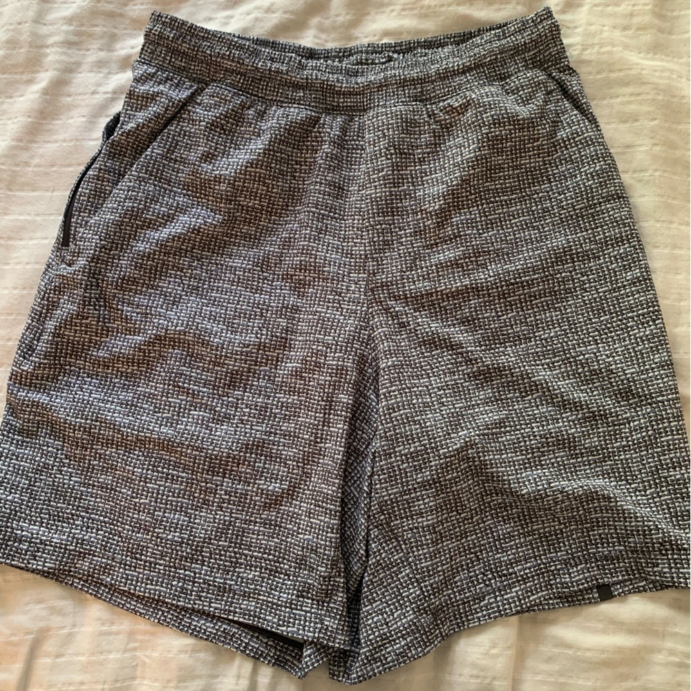 Men’s Lululemon shorts in a black, white and grey pattern